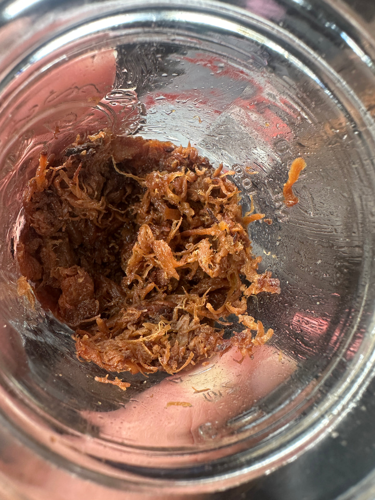 Adobo Flakes on salad with fork