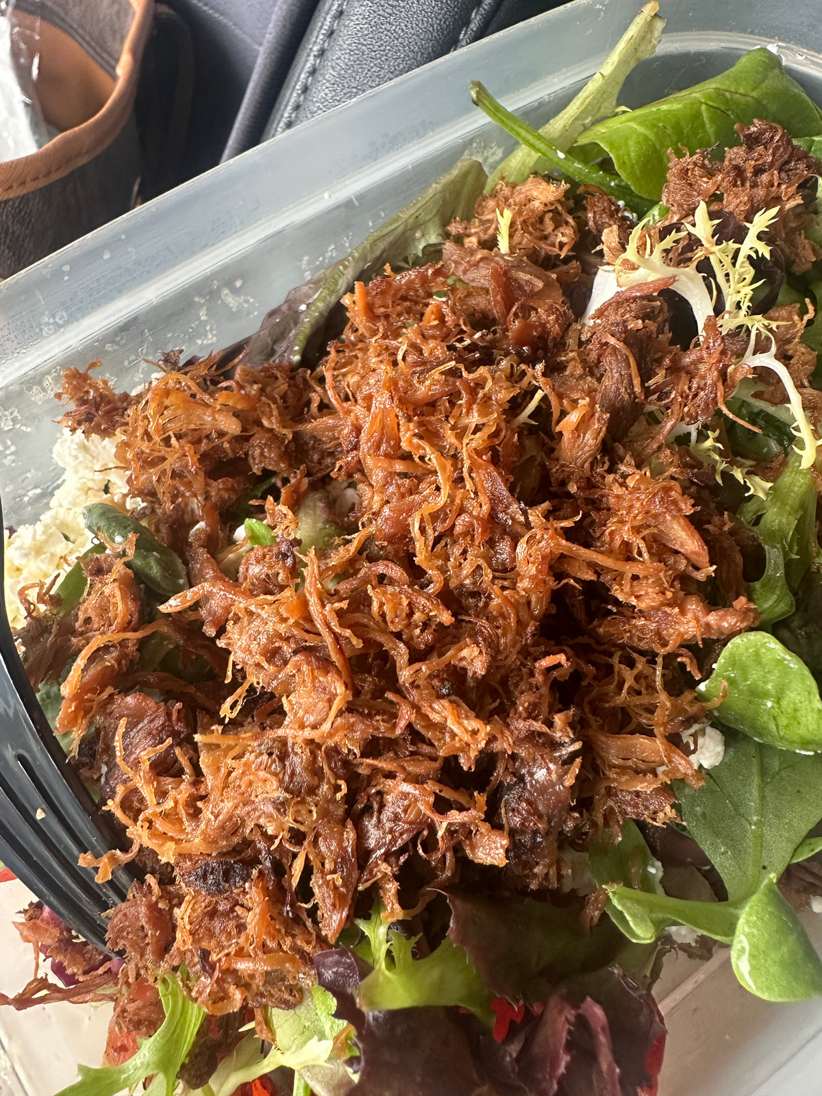 Adobo Flakes served on salad